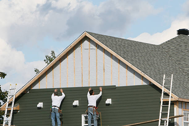 Professional Storm Damage Siding Repair technician working in Hobart, IN